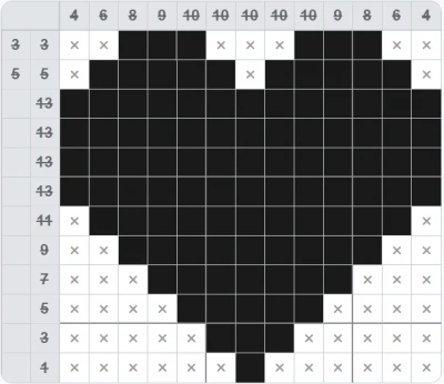 Finished solution: a filled heart and struck-out numbers
